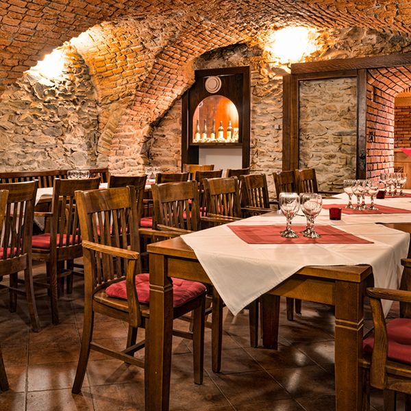 Cozy hotel cellars are ideal for a wedding dinner in a small company.
